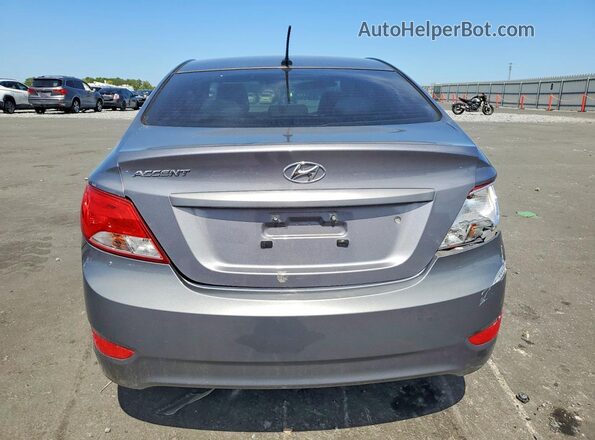 KMHCT4AE9GU166022 2016 HYUNDAI ACCENT Gray Вид ззаду