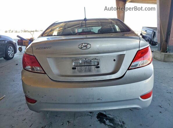 KMHCT4AEXGU058203 2016 HYUNDAI ACCENT Серебряный Вид сзади