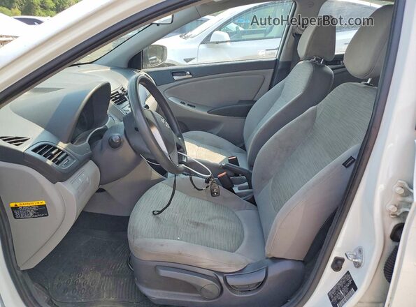 KMHCT4AEXGU990546 2016 HYUNDAI ACCENT White წინა სალონის ხედი