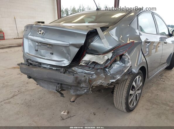 KMHCT4AEXHU359880 2017 HYUNDAI ACCENT Gray Front view
