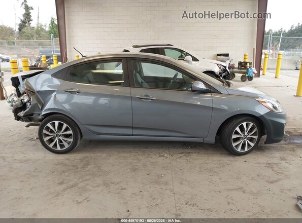KMHCT4AEXHU359880 2017 HYUNDAI ACCENT Gray Rear interior view