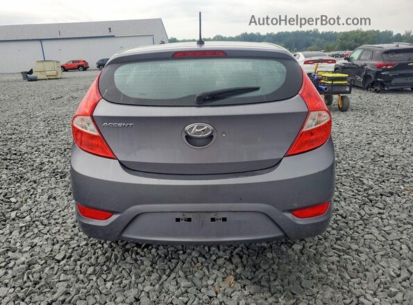 KMHCT5AE0HU317076 2017 HYUNDAI ACCENT Gray Widok z tyłu