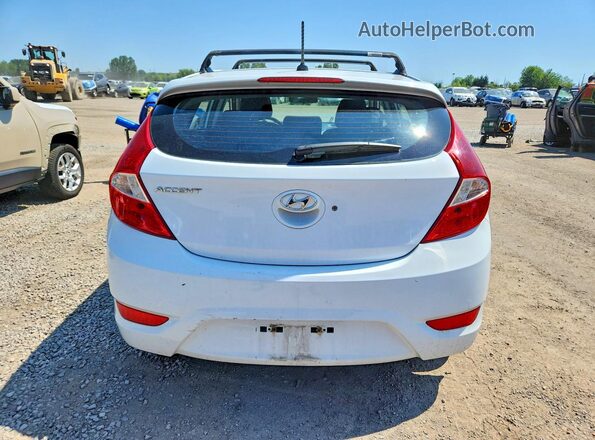 KMHCT5AE0HU351891 2017 HYUNDAI ACCENT White Вид ззаду