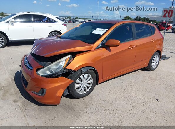 KMHCT5AE1GU294499 2016 HYUNDAI ACCENT Orange Առջևի ձախ երեք քառորդ տեսարան