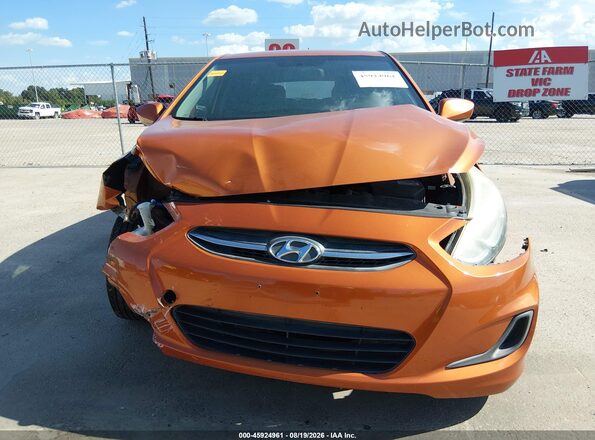 KMHCT5AE1GU294499 2016 HYUNDAI ACCENT Orange Սալոնի հետևի տեսք