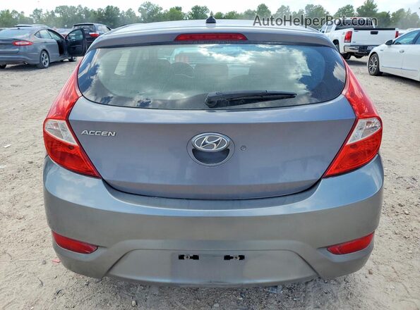 KMHCT5AE3HU338472 2017 HYUNDAI ACCENT Серый Вид сзади