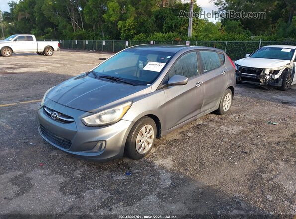 KMHCT5AE4GU237889 2016 HYUNDAI ACCENT Gray Vista tres cuartos delantera izquierda