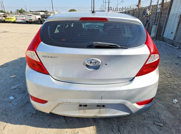 KMHCT5AE8HU336023 2017 HYUNDAI ACCENT Серебряный Вид сзади