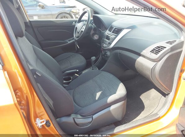 KMHCT5AE9GU244269 2016 HYUNDAI ACCENT Orange Front interior view