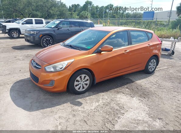 KMHCT5AE9GU244269 2016 HYUNDAI ACCENT Orange Front left