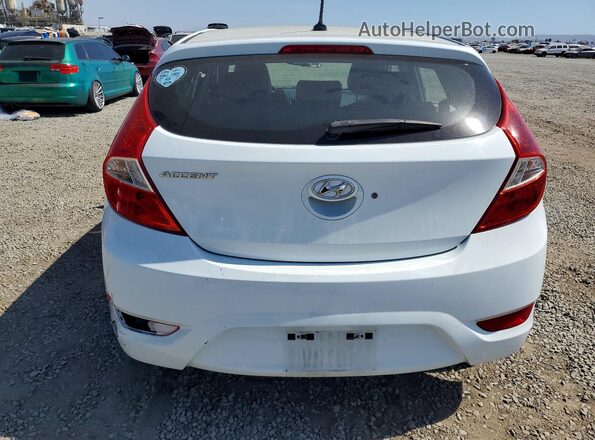 KMHCT5AE9GU255076 2016 HYUNDAI ACCENT White Вид ззаду