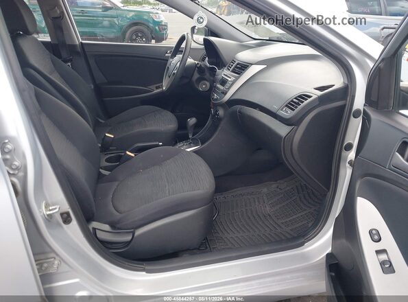 KMHCT5AEXGU274879 2016 HYUNDAI ACCENT Серебряный Вид салона спереди