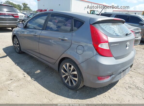 KMHCU5AE5HU313988 2017 HYUNDAI ACCENT Gray Rear left