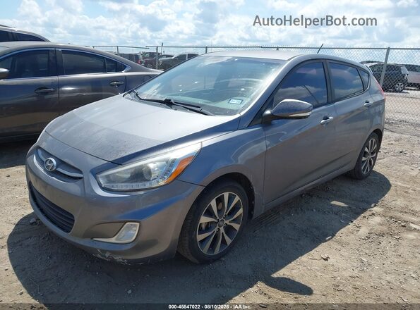 KMHCU5AE5HU313988 2017 HYUNDAI ACCENT Gray Front left