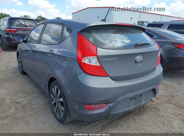 KMHCU5AE5HU313988 2017 HYUNDAI ACCENT Gray Front view