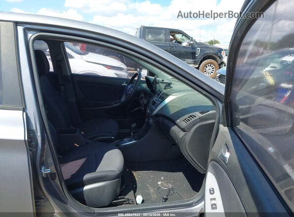 KMHCU5AE5HU313988 2017 HYUNDAI ACCENT Gray Front interior view
