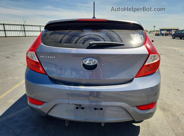 KMHCU5AE8HU333538 2017 HYUNDAI ACCENT Gray უკანა ხედი