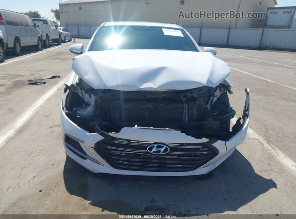 KMHD04LB2JU587197 2018 HYUNDAI ELANTRA White უკანა სალონის ხედი