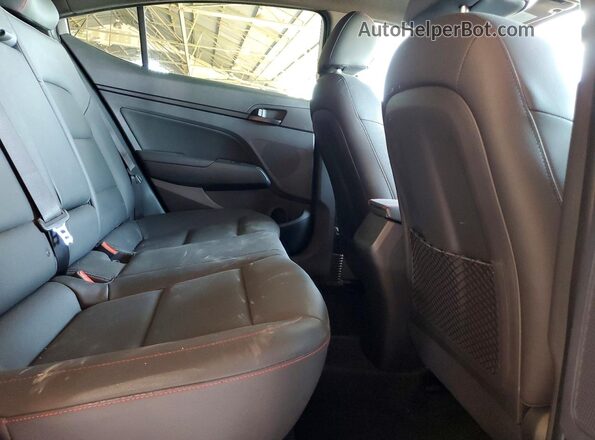 KMHD04LB7JU482011 2018 HYUNDAI ELANTRA White Widok tylnych siedzeń