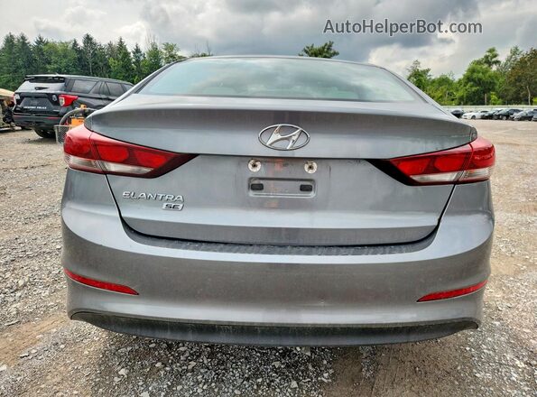 KMHD74LF0JU554861 2018 HYUNDAI ELANTRA Серебряный Вид сзади