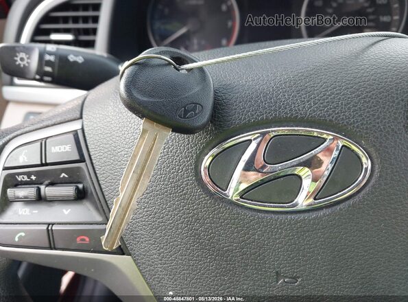 KMHD74LF6HU302011 2017 HYUNDAI ELANTRA Red Vista del salpicadero