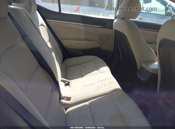 KMHD74LF8JU599983 2018 HYUNDAI ELANTRA Champagne VIN կոդի պիտակի տեսք