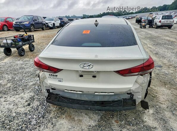 KMHD74LFXHU357416 2017 HYUNDAI ELANTRA Бежевый Вид сзади