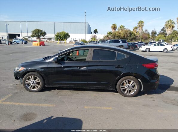 KMHD84LF0JU503051 2018 HYUNDAI ELANTRA Black Սալոնի հետևի տեսք