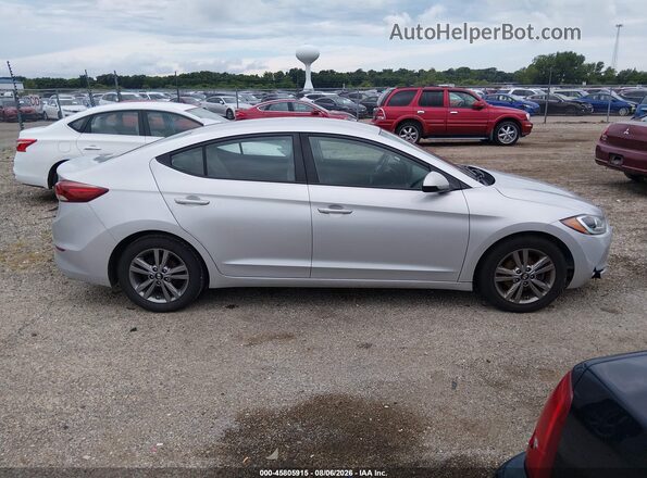 KMHD84LF0JU574119 2018 HYUNDAI ELANTRA Silver Rear interior view