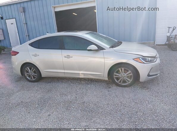KMHD84LF5HU427577 2017 HYUNDAI ELANTRA Champagne Սալոնի հետևի տեսք