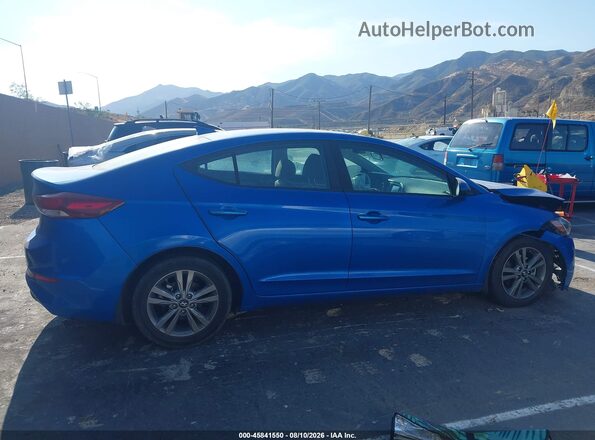 KMHD84LFXJU563516 2018 HYUNDAI ELANTRA Blue Rear interior view