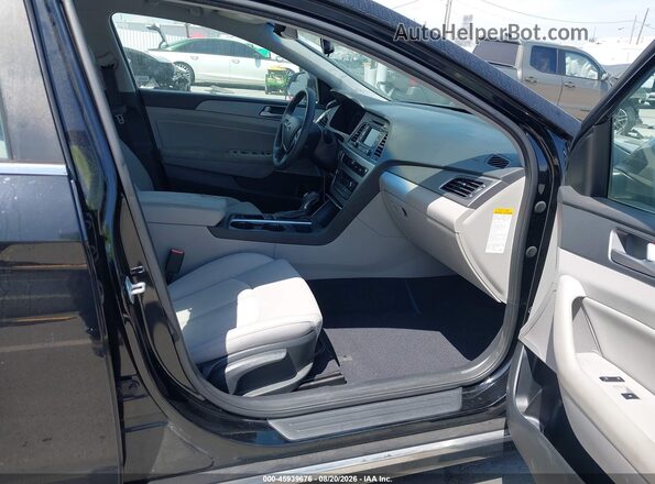 KMHE24L16GA028994 2016 HYUNDAI SONATA HYBRID Black Front interior view