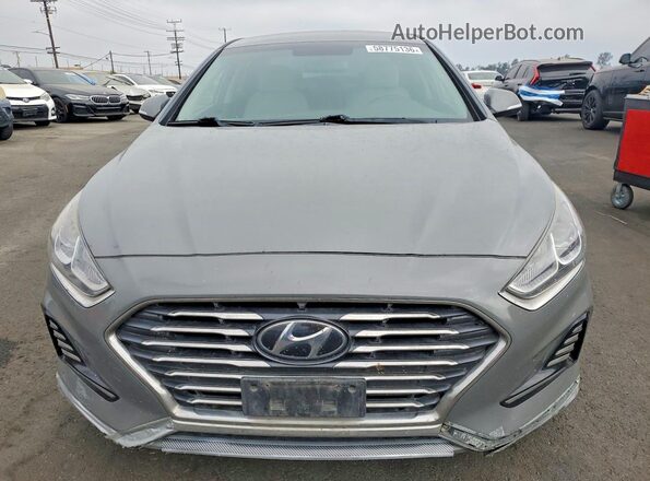 KMHE24L35KA094057 2019 HYUNDAI SONATA Gray Front view