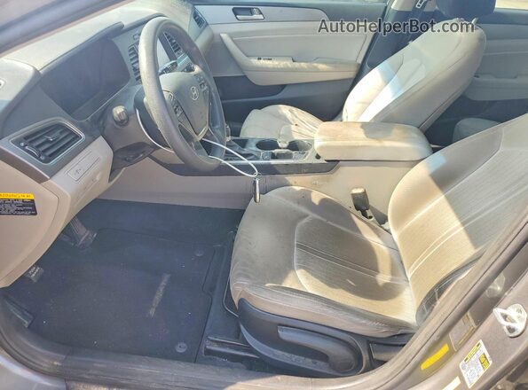 KMHE24L39HA072555 2017 HYUNDAI SONATA Charcoal Front interior view