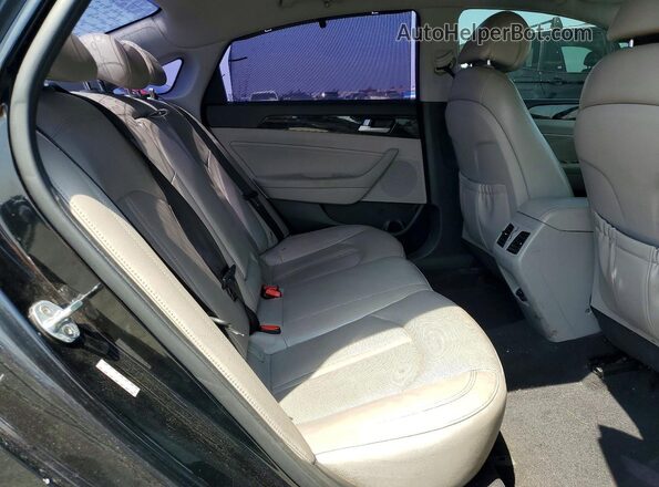 KMHE34L11GA033534 2016 HYUNDAI SONATA Black Rear seats view