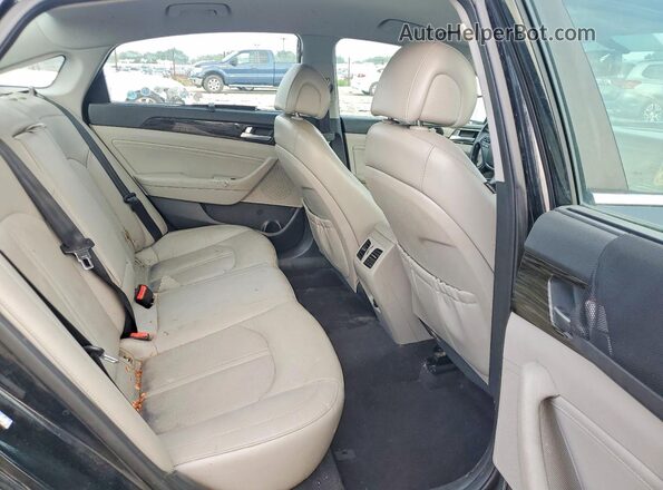 KMHE34L14HA050572 2017 HYUNDAI SONATA Black Rear seats view