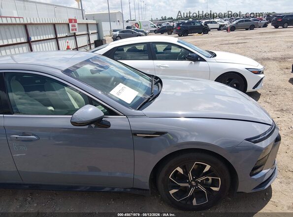 KMHL64JA2SA472896 2025 HYUNDAI SONATA Champagne Սալոնի հետևի տեսք