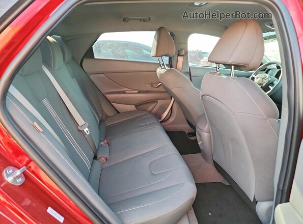 KMHLM4DG6TU143446 2026 HYUNDAI ELANTRA Red Rear seats view