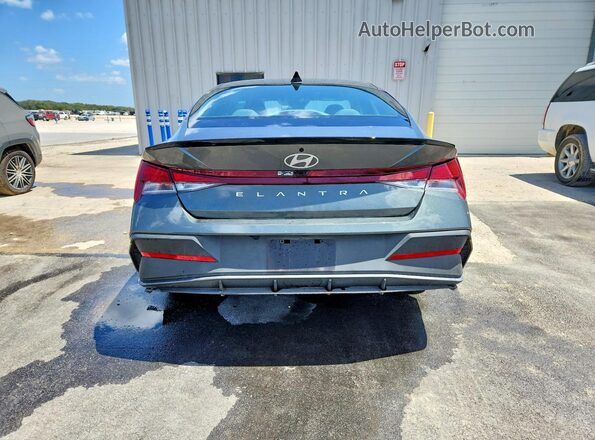 KMHLM4DG7TU123450 2026 HYUNDAI ELANTRA Серый Вид сзади