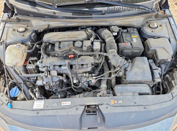 KMHLR4AFXPU435667 2023 HYUNDAI ELANTRA Silver Rear interior view