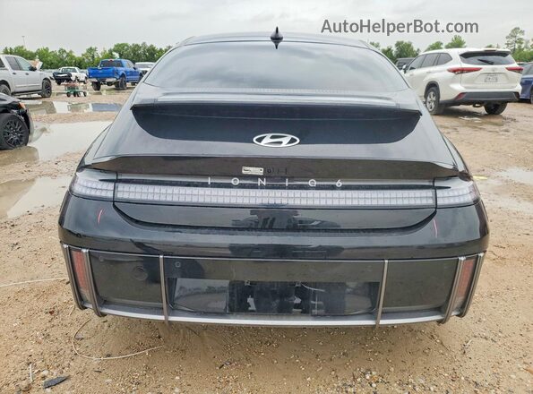 KMHM34AA0SA114306 2025 HYUNDAI IONIQ Black უკანა ხედი