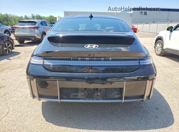 KMHM34AA5SA107710 2025 HYUNDAI IONIQ Black Вид ззаду