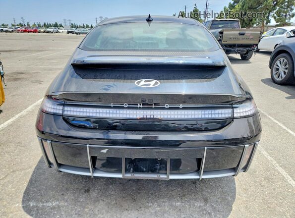 KMHM34AAXRA055226 2024 HYUNDAI IONIQ Black Vista trasera