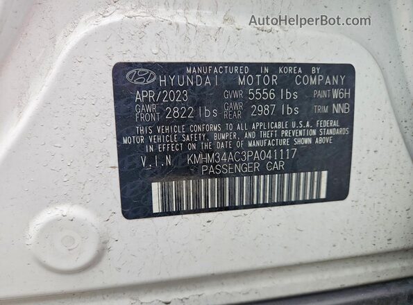 KMHM34AC3PA041117 2023 HYUNDAI IONIQ White Widok komory silnika