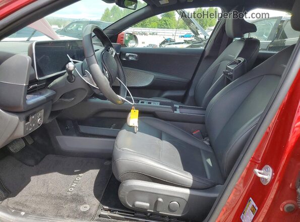 KMHM34AC9PA022782 2023 HYUNDAI IONIQ Red Widok wnętrza z przodu