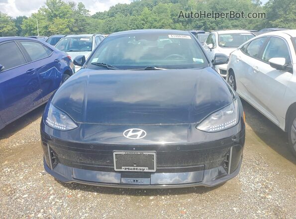 KMHM54AA4PA036467 2023 HYUNDAI IONIQ Black Front view