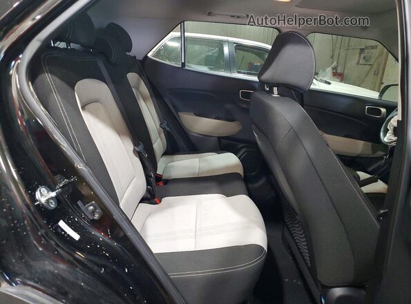 KMHRC8A30PU213227 2023 HYUNDAI VENUE Black Вид задньої частини салону