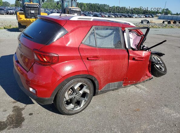 KMHRC8A31PU231865 2023 HYUNDAI VENUE Maroon Trasero derecho
