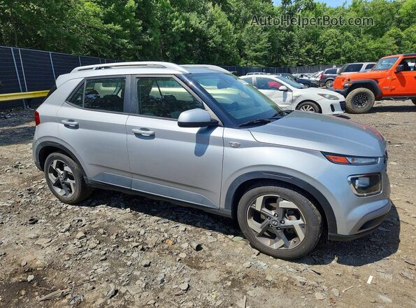 KMHRC8A32NU189381 2022 HYUNDAI VENUE Silver Widok wnętrza z przodu