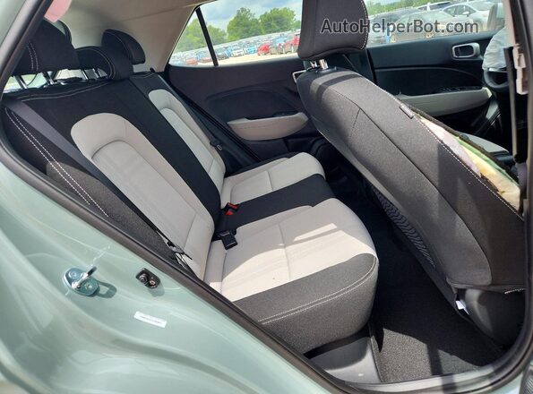 KMHRC8A32TU466043 2026 HYUNDAI VENUE Бирюзовый Вид задней части салона